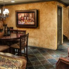 Wine Room Makeover Tuscan plaster walls chiseled grape motifs and faux finished barn siding trim and doors